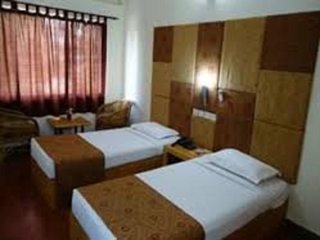 Hotel Dejavu Coimbatore Zimmer foto